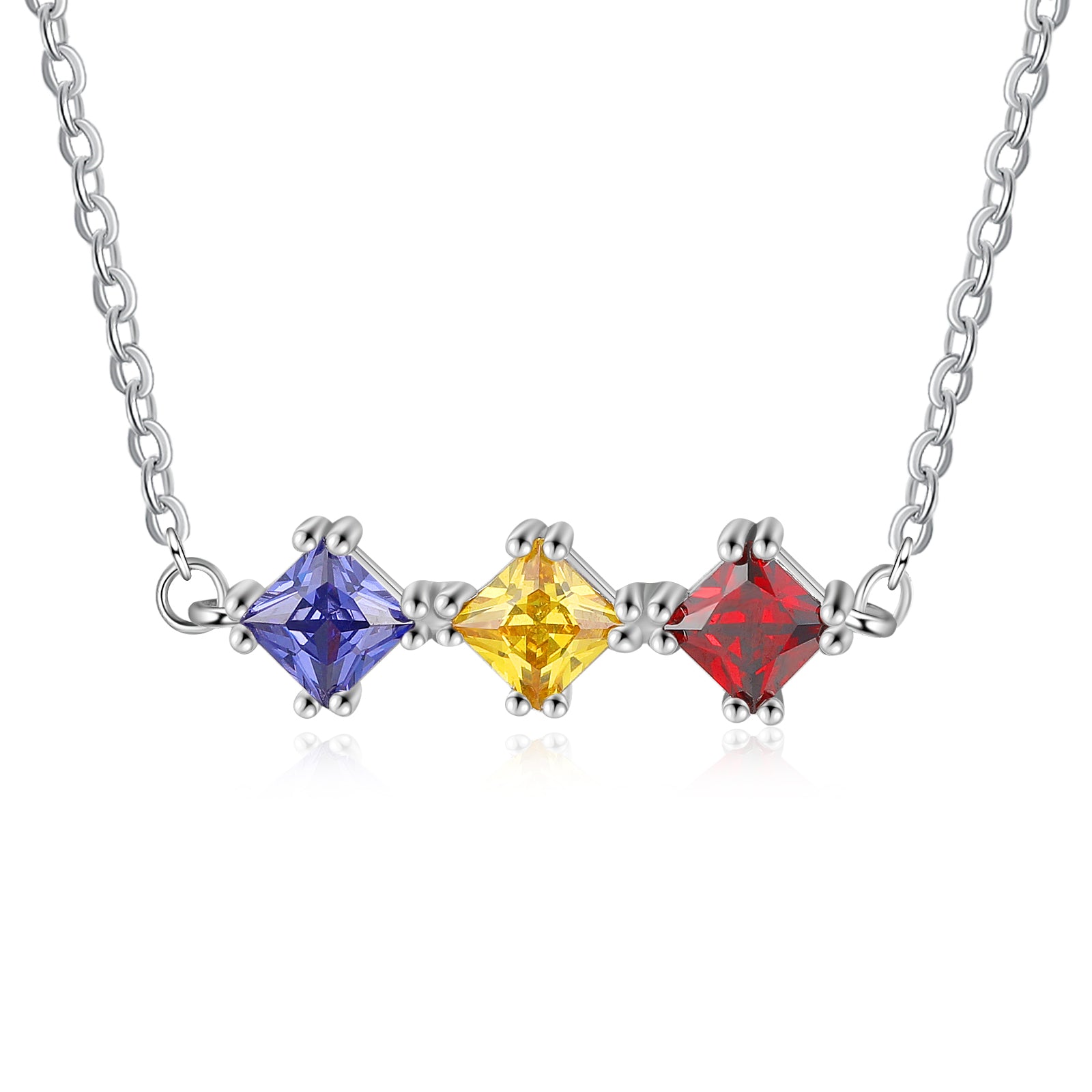 Custom Three Birthstone Necklace in white gold plating with three personalized birthstones.