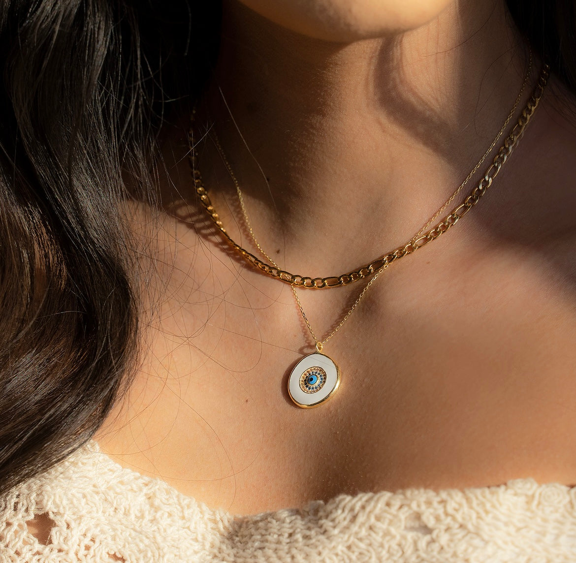 CYRA Necklace featuring a yellow gold plated medallion drop pendant with evil eye design, crafted from 925 sterling silver.