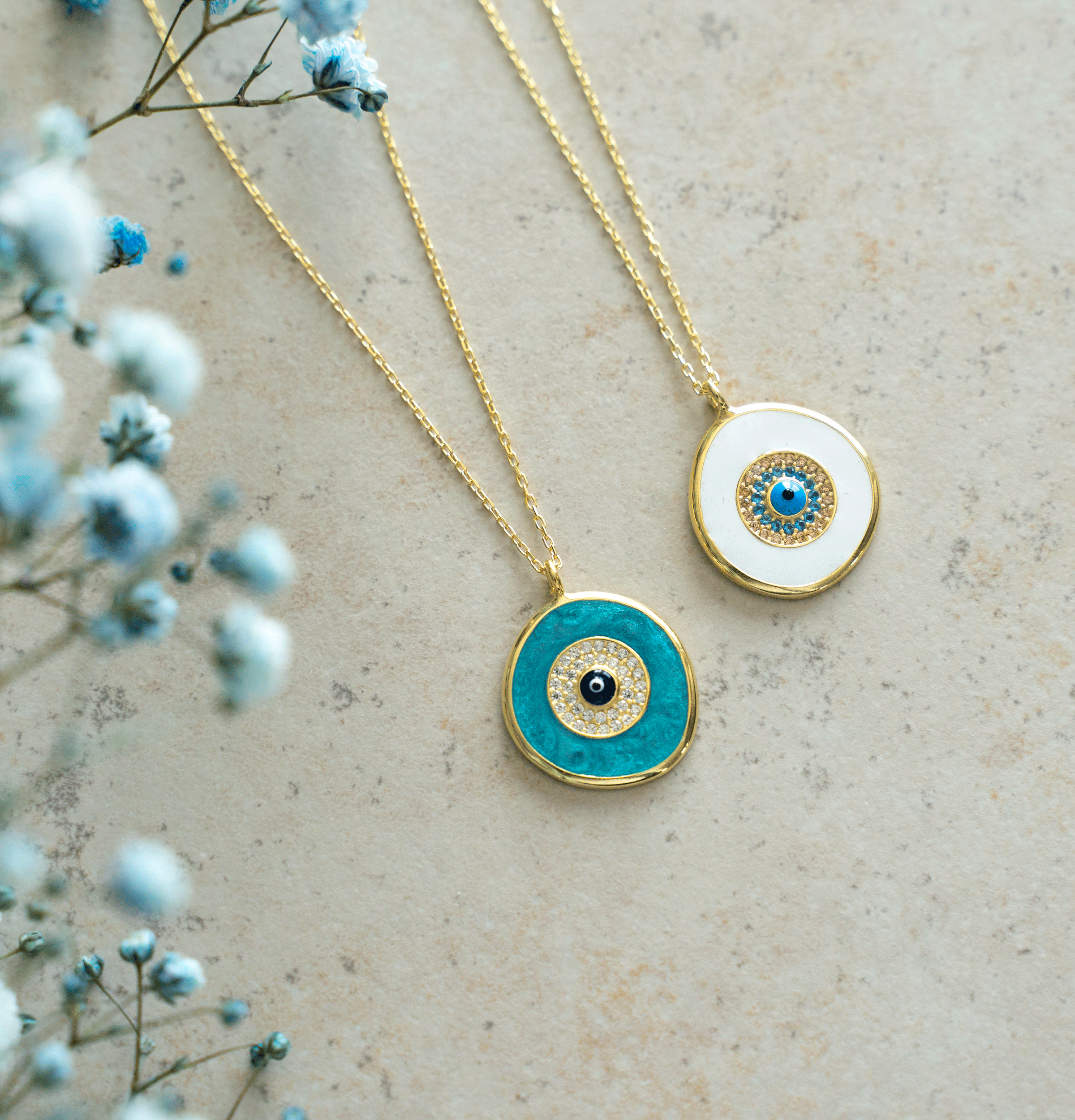 CYRA Necklace featuring a yellow gold plated medallion drop pendant with evil eye design, crafted from 925 sterling silver.