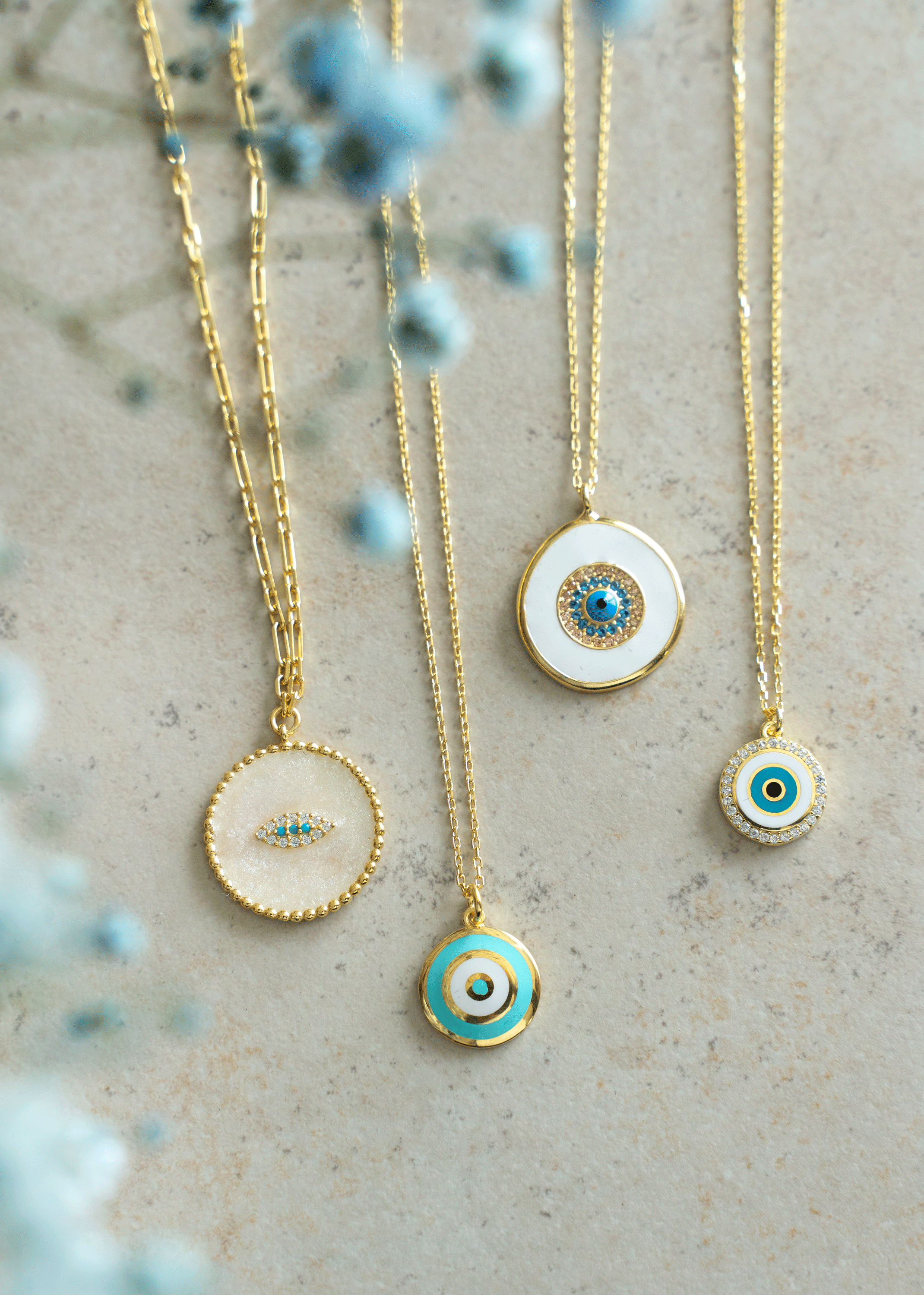 CYRA Necklace featuring a yellow gold plated medallion drop pendant with evil eye design, crafted from 925 sterling silver.