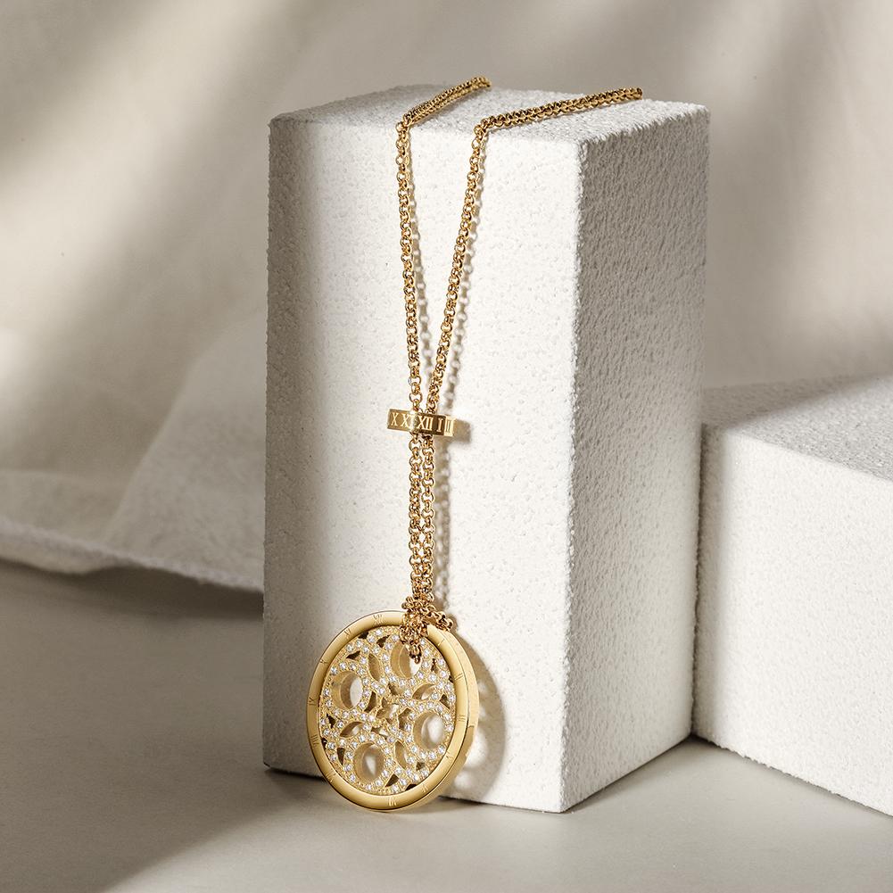 CZ Clover Medallion Necklace made of surgical stainless steel with 14K gold plating, featuring a clover design.