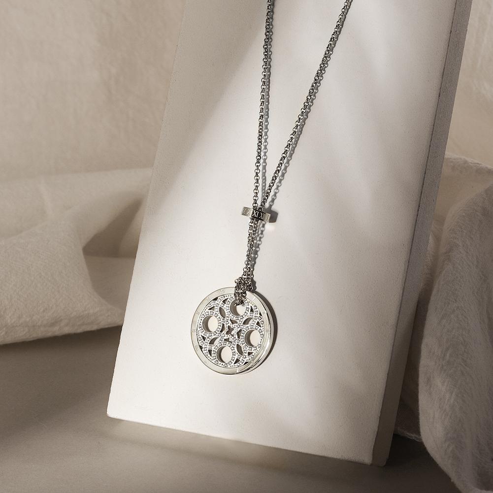 CZ Clover Medallion Necklace made of surgical stainless steel with 14K gold plating, featuring a clover design.