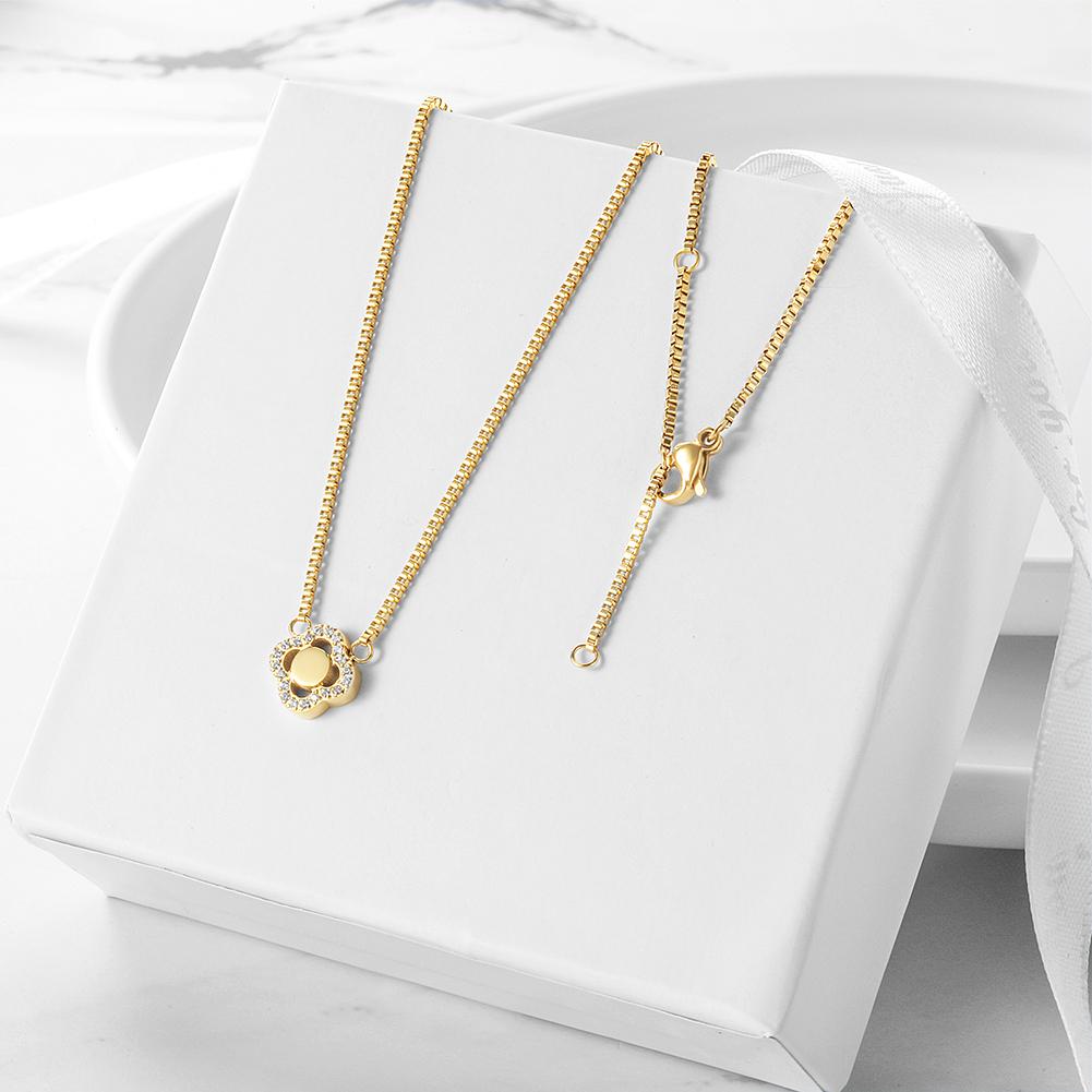 CZ Clover Necklace made of surgical stainless steel with 14K gold plating, featuring a charming clover design adorned with cubic zirconia.