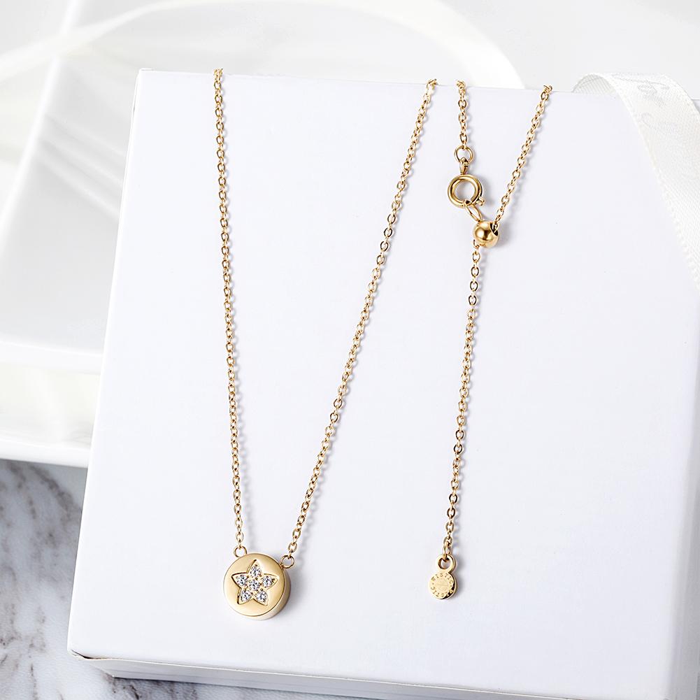 CZ Star Shaped Disc Pendant Necklace made of stainless steel with gold plating and cubic zirconia accents.