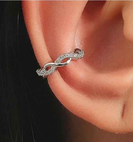 CZ Twist Ear Cuff featuring a silvertone finish and sparkling cubic zirconia stones, designed for a stylish upper ear fit.