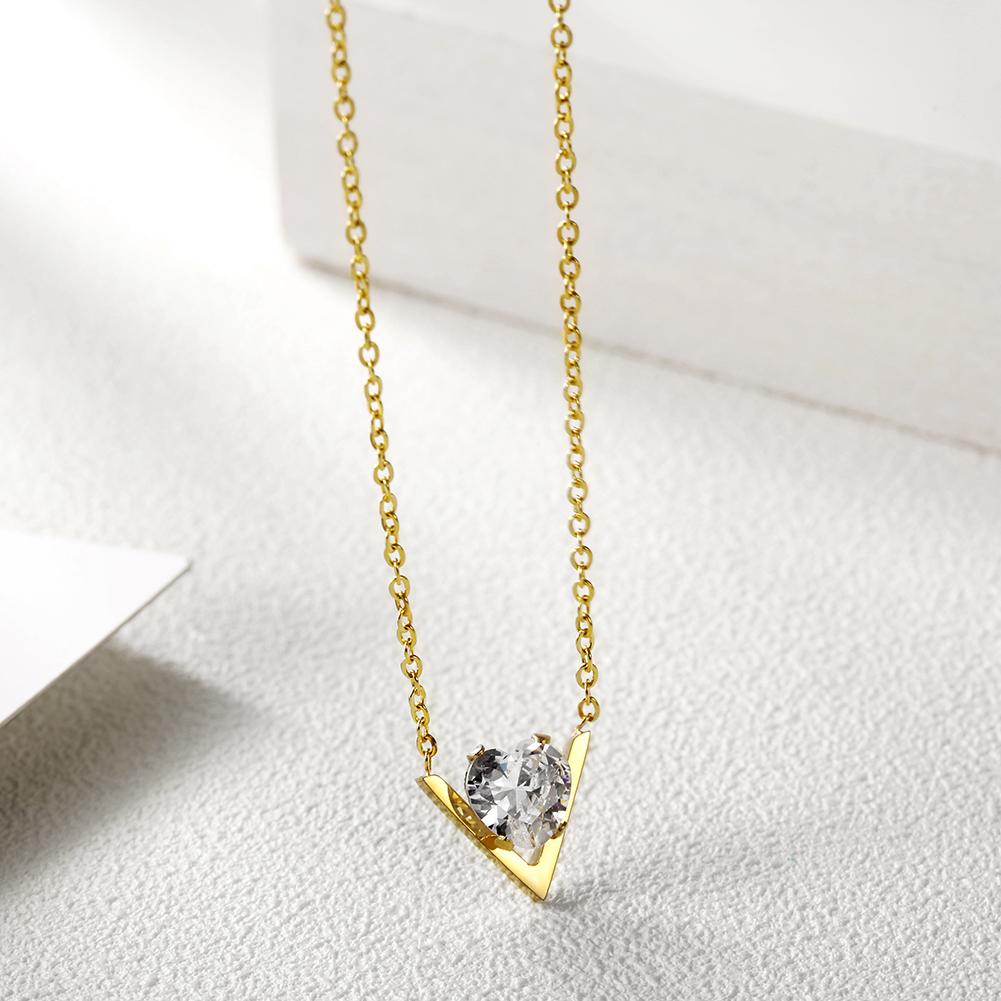 CZ V-Shaped Set Pendant Necklace made of stainless steel with gold plating and cubic zirconia accents, showcasing a modern design.