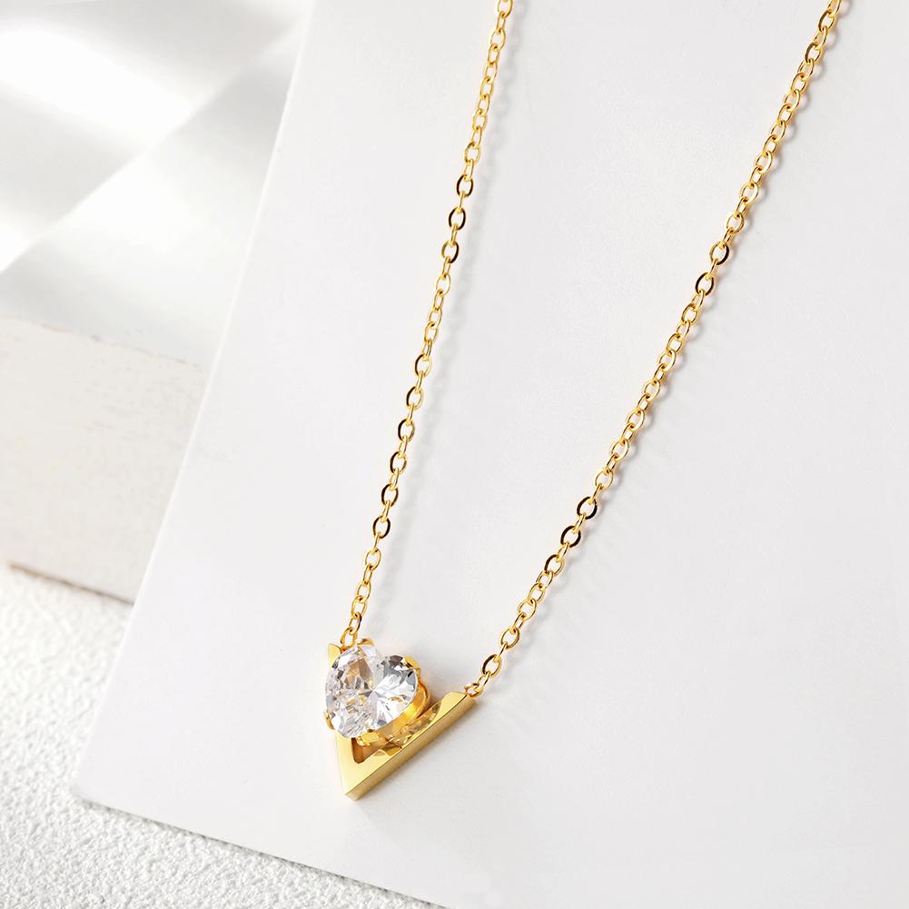 CZ V-Shaped Set Pendant Necklace made of stainless steel with gold plating and cubic zirconia accents, showcasing a modern design.