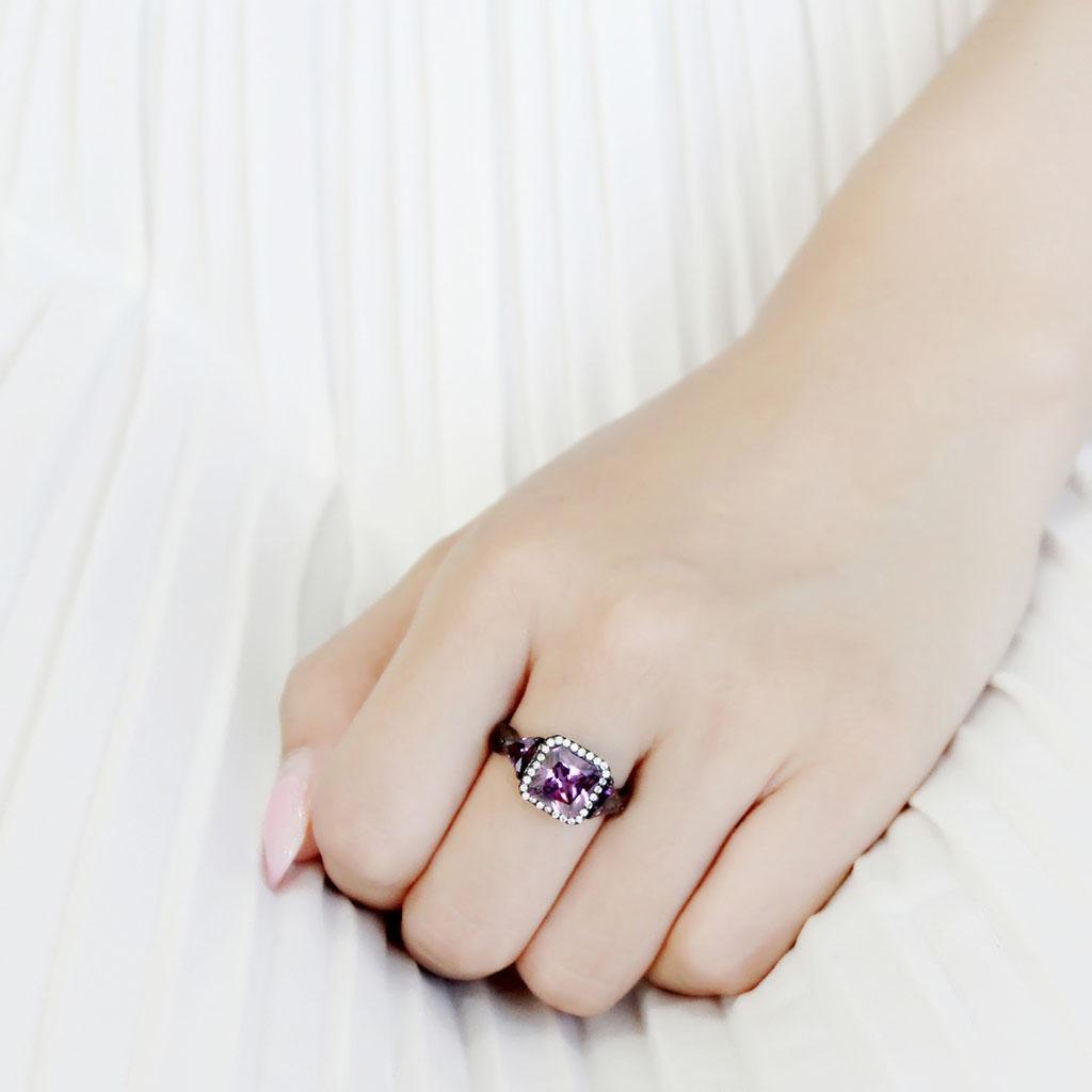 DA346 IP Black Stainless Steel Ring featuring AAA Grade CZ in amethyst color, showcasing its elegant design and durable material.