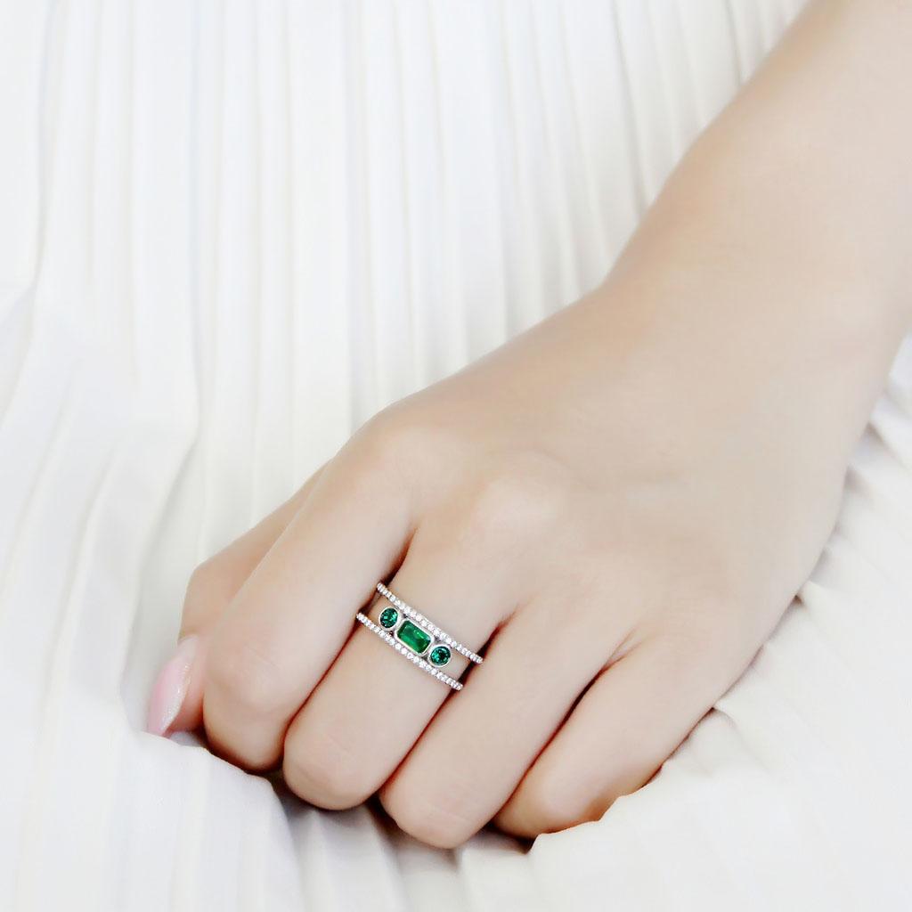 DA348 High Polished Stainless Steel Ring featuring a synthetic emerald stone, showcasing a sleek and shiny design.