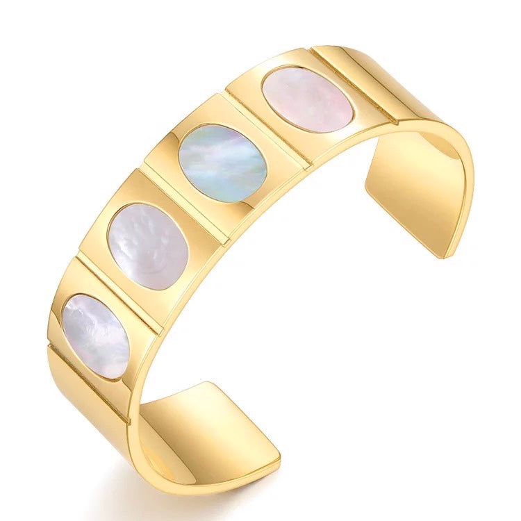 Dahlia Cuff featuring elegant gold and pearl design, perfect for any occasion.