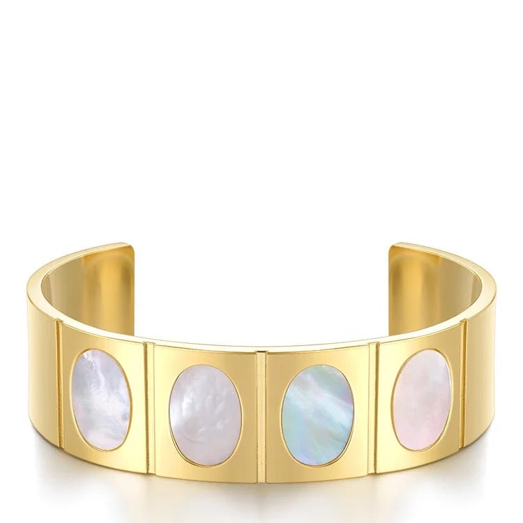 Dahlia Cuff featuring elegant gold and pearl design, perfect for any occasion.