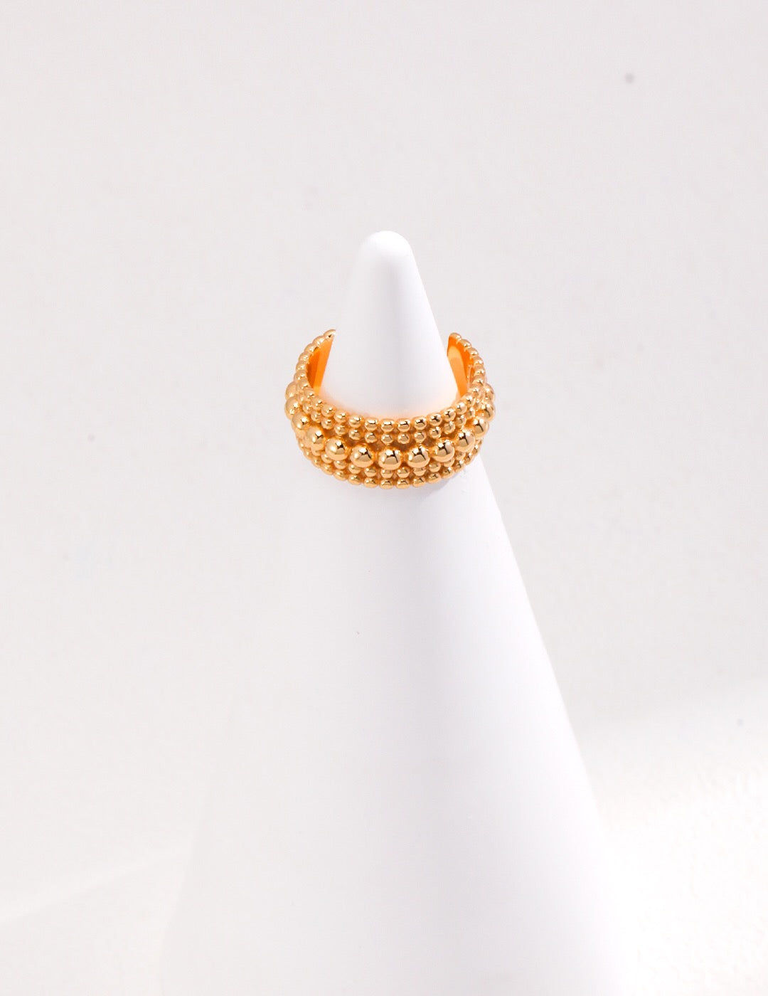 A delicate Dainty Beaded Band Ring made of sterling silver with gold vermeil, showcasing its intricate beaded design.