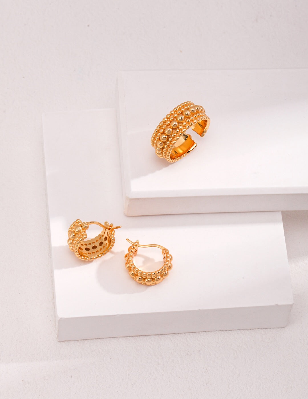 A delicate Dainty Beaded Band Ring made of sterling silver with gold vermeil, showcasing its intricate beaded design.