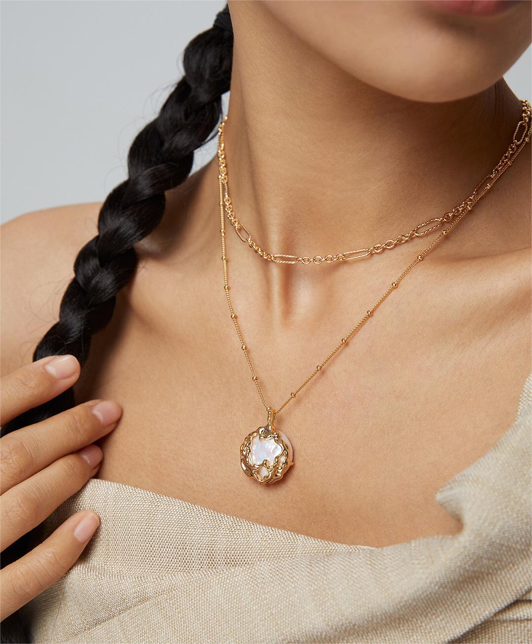 Dainty Big Round Pearl Pendant Necklace featuring a natural pearl and gold vermeil chain, elegantly displayed on a soft background.