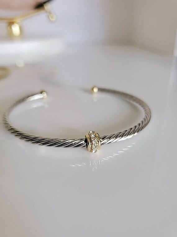 Dainty Cable Bangle in Gold and Silver, featuring a delicate 18K Gold Filled design with a stylish cable pattern.