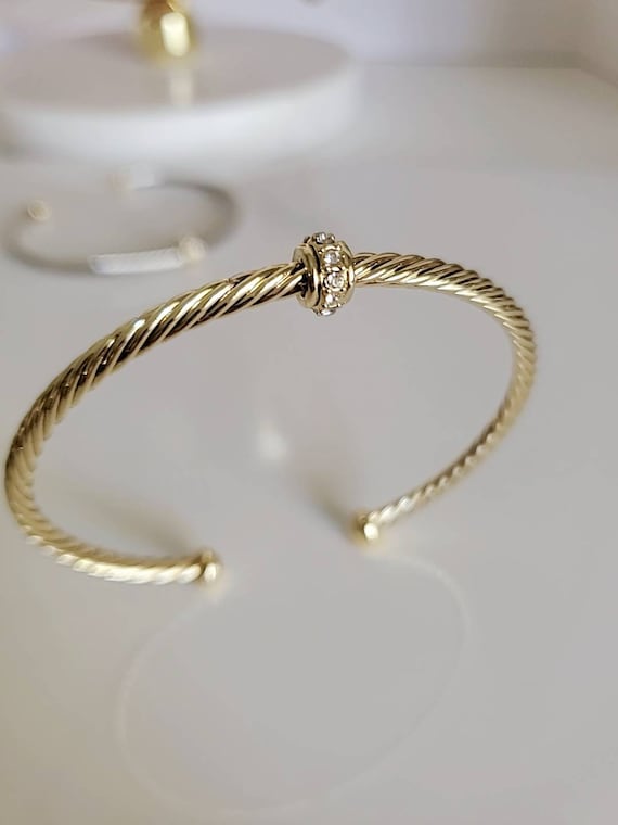 Dainty Cable Bangle in Gold and Silver, featuring a delicate 18K Gold Filled design with a stylish cable pattern.