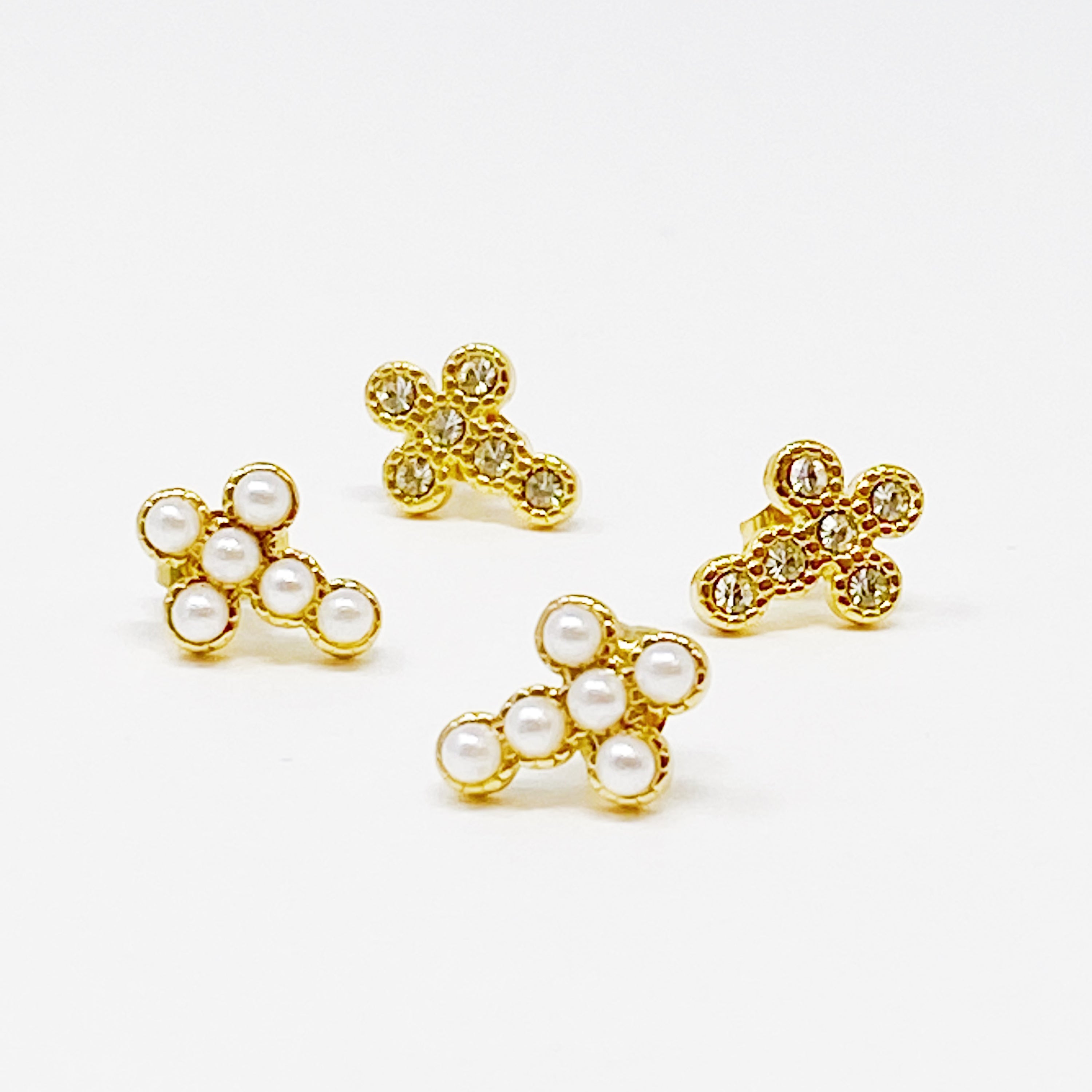 Dainty Cross Stud Earrings featuring sparkly cubic zirconia and pearl beads on a gold plated stainless steel base.