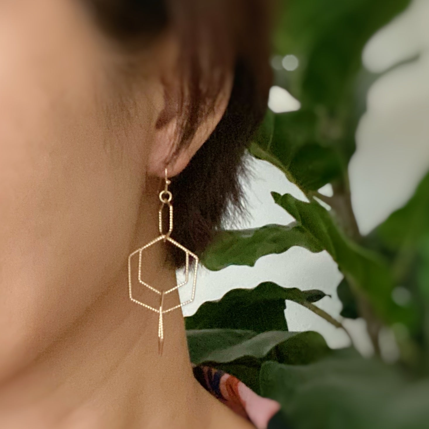 Dainty Dimensional Drop Earrings featuring hexagon designs in gold plated alloy, showcasing a beautiful shine and lightweight construction.