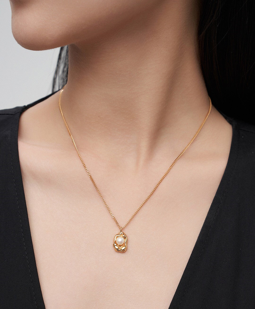 Dainty Freshwater Pearl Pendant Necklace featuring natural pearls and gold vermeil on sterling silver, elegantly displayed on a soft background.