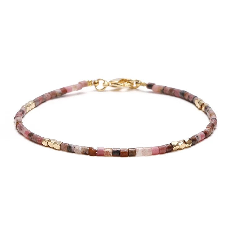 Dainty Gemstone Tube Bead Bracelet featuring tiny natural gemstone beads in various colors, adjustable size for comfort.