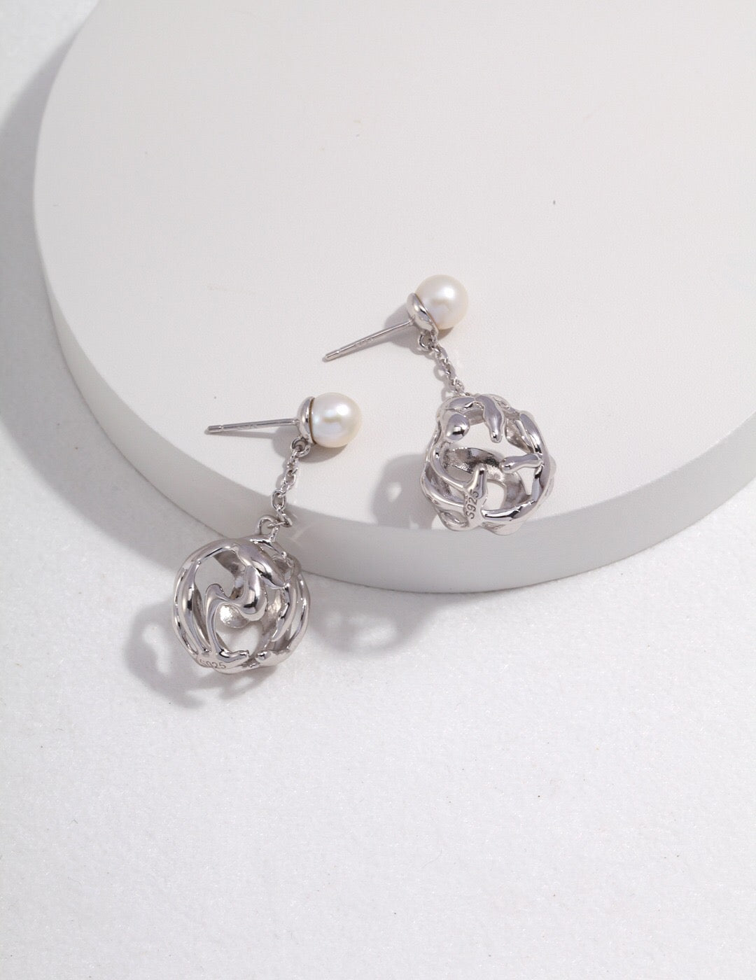 Dainty Hollow Pearl Earrings featuring natural freshwater pearls and sterling silver, elegantly designed for a timeless look.