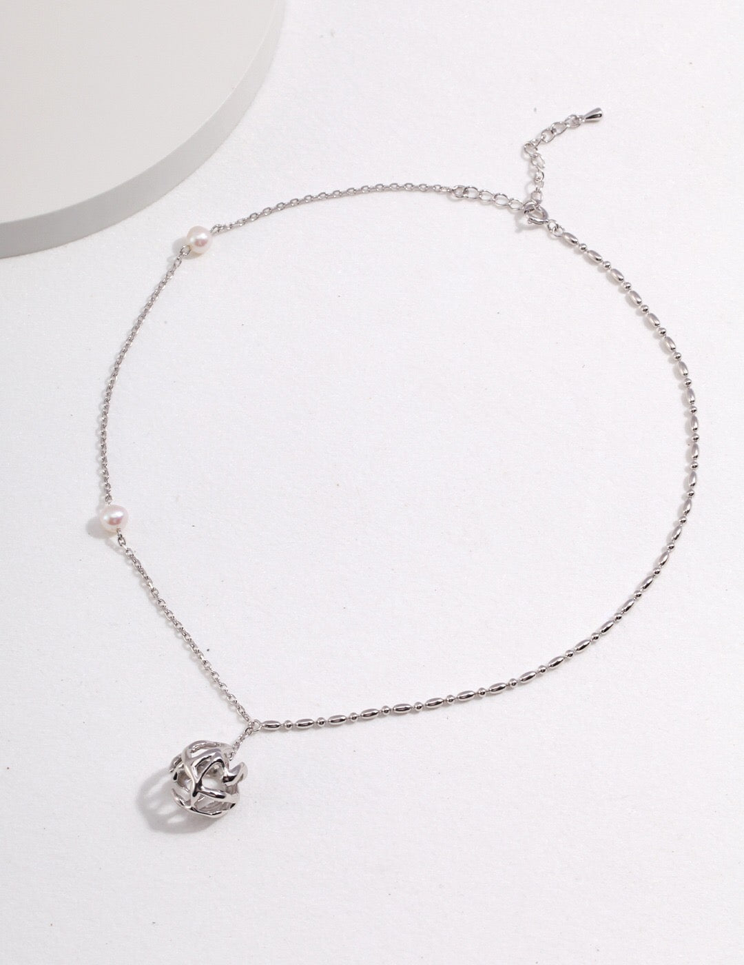 Dainty Hollow Pearl Necklace featuring natural freshwater pearls on a sterling silver chain with gold vermeil accents.