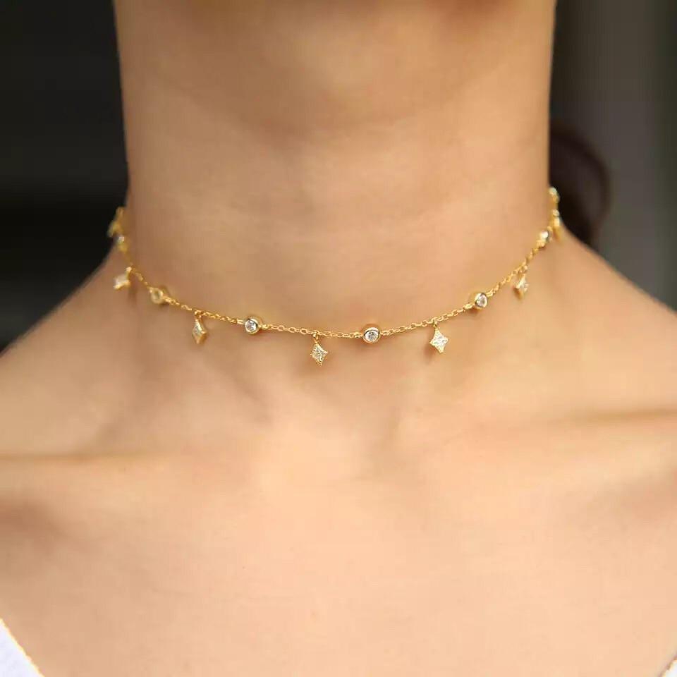 Dainty Pave Choker featuring sterling silver and 14k gold plating with micro Pave CZ details, elegantly displayed on a soft background.