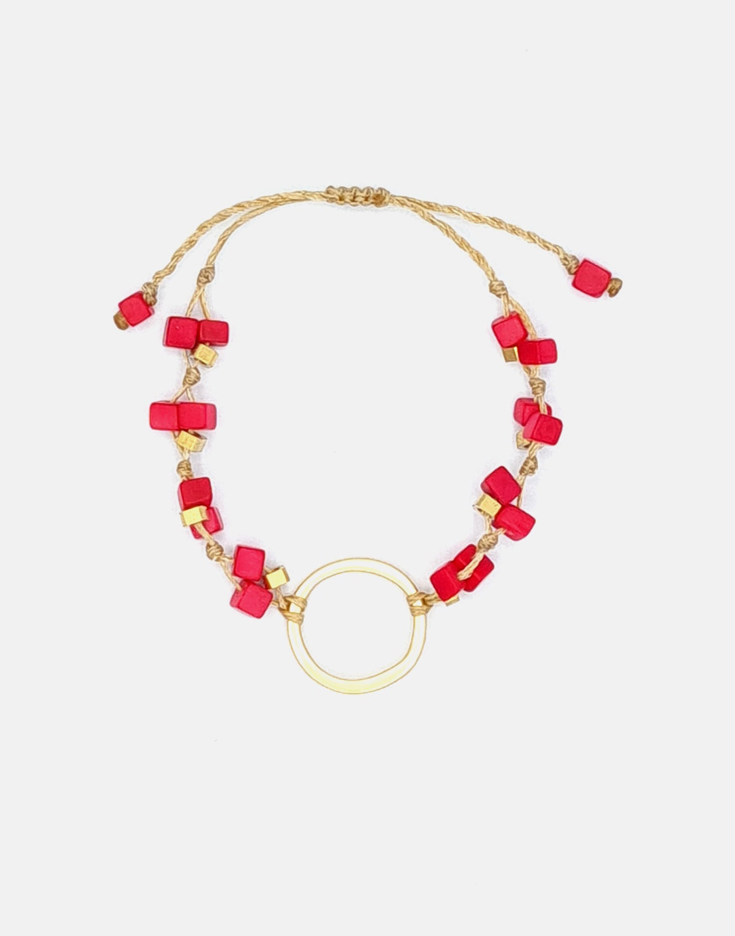 A delicate Dainty Tagua Bracelet featuring mini tagua squares and brass details, elegantly displayed on a soft background.