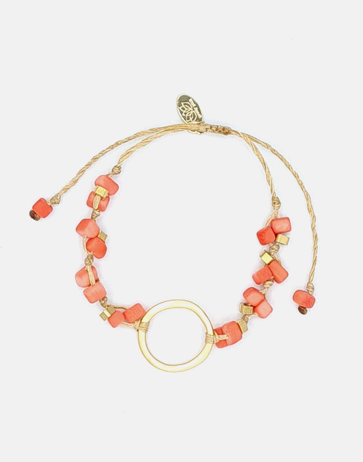 A delicate Dainty Tagua Bracelet featuring mini tagua squares and brass details, elegantly displayed on a soft background.