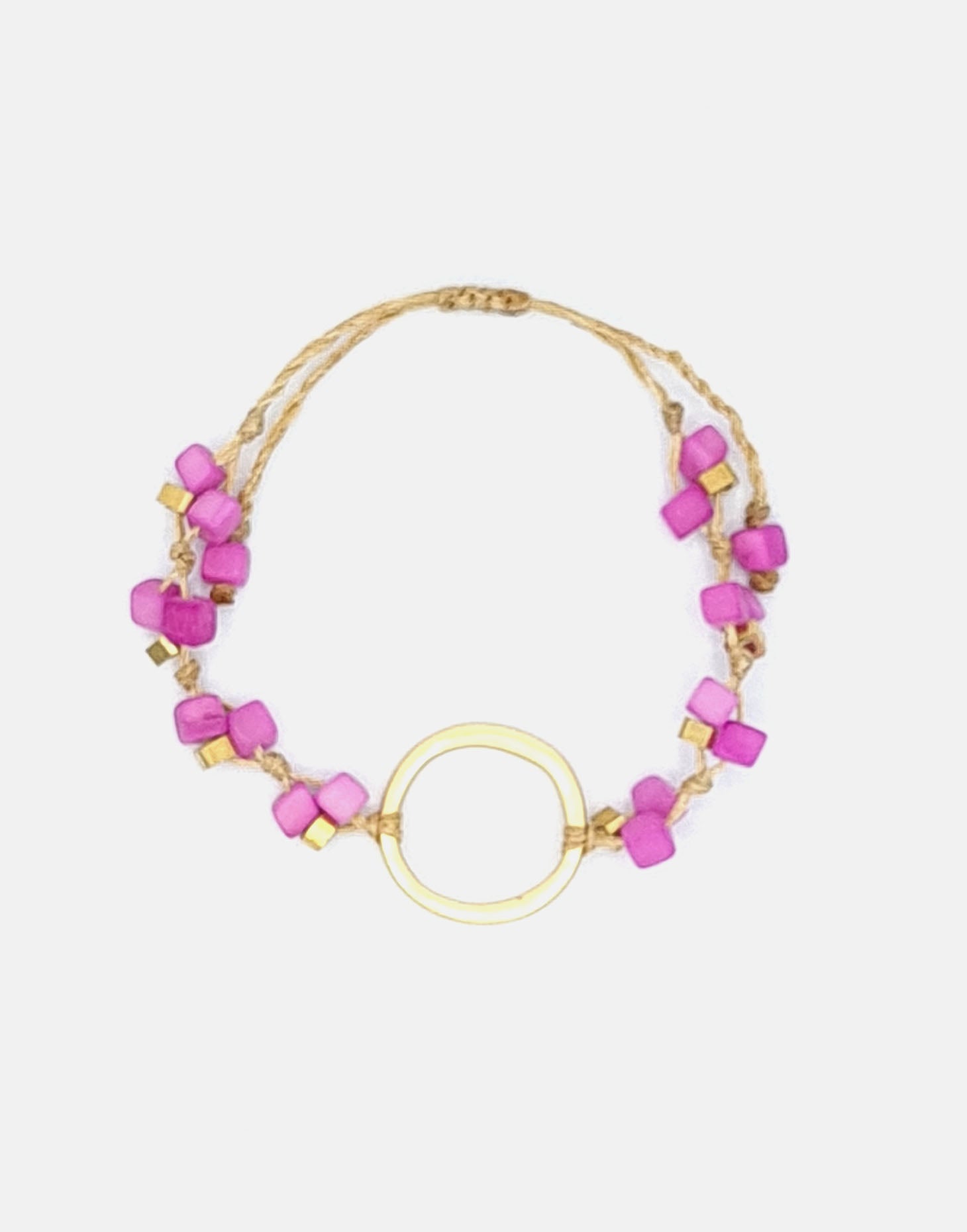 A delicate Dainty Tagua Bracelet featuring mini tagua squares and brass details, elegantly displayed on a soft background.