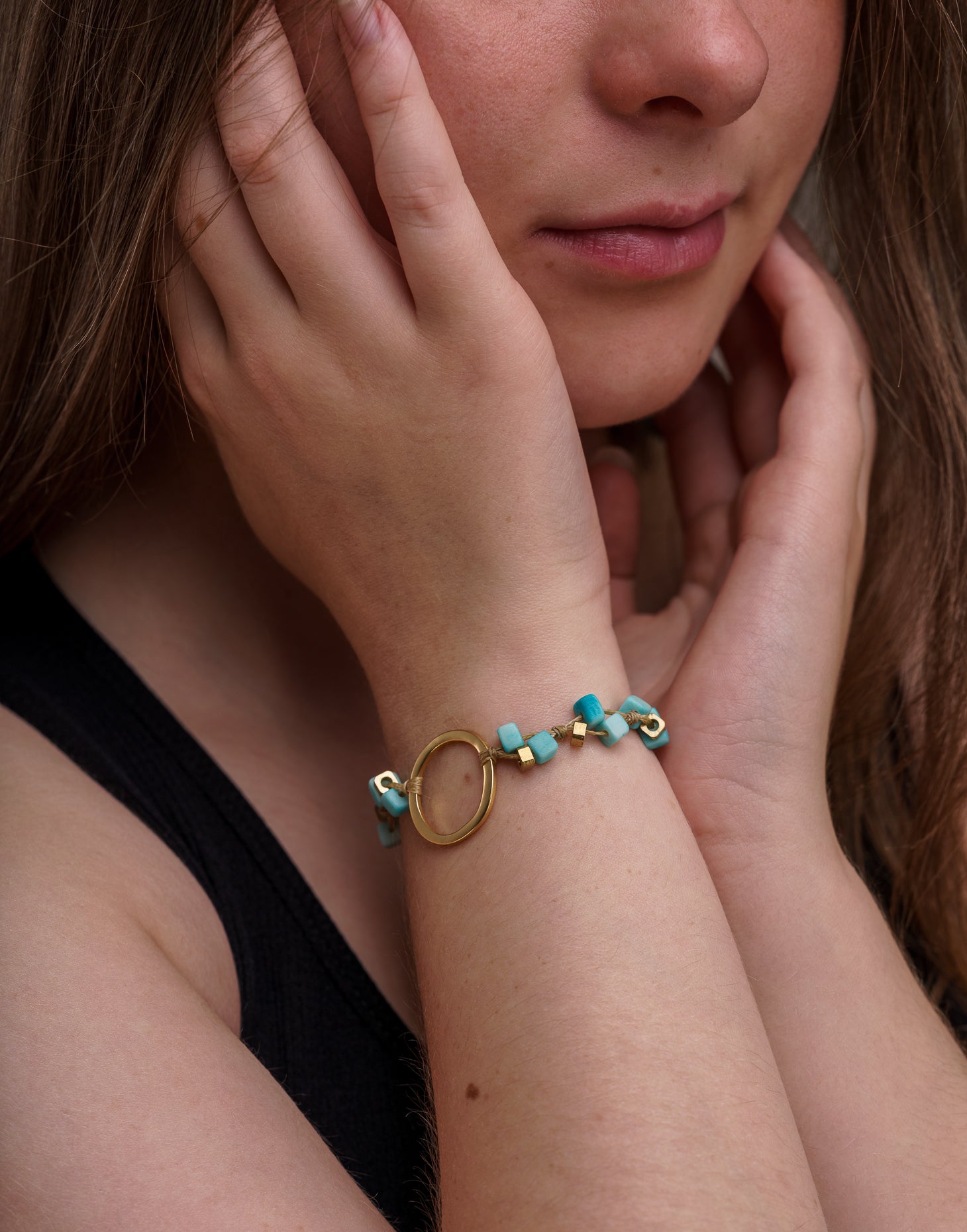 A delicate Dainty Tagua Bracelet featuring mini tagua squares and brass details, elegantly displayed on a soft background.