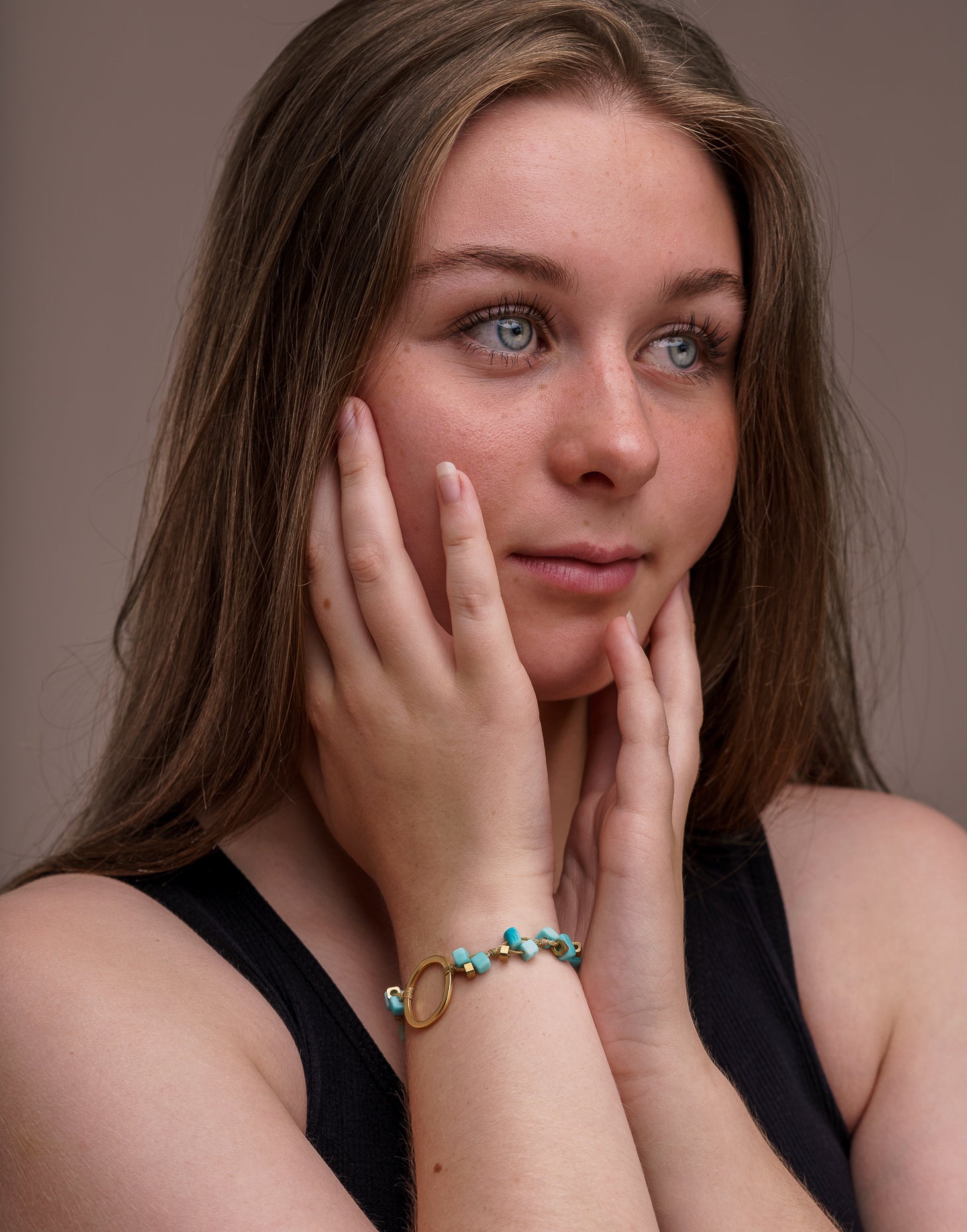 A delicate Dainty Tagua Bracelet featuring mini tagua squares and brass details, elegantly displayed on a soft background.