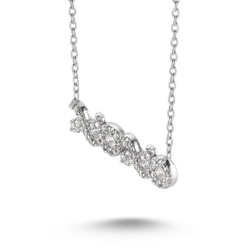 Dainty XOXO Silver Necklace Pendant featuring handmade 925 Sterling Silver with CZ crystal, displayed elegantly on a soft background.