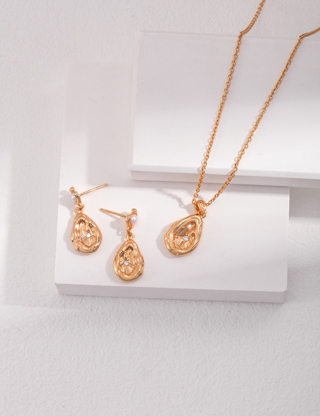 Elegant Dainty Zircon Droplet Pearl Earrings featuring natural pearls and gold vermeil, showcasing a delicate design.