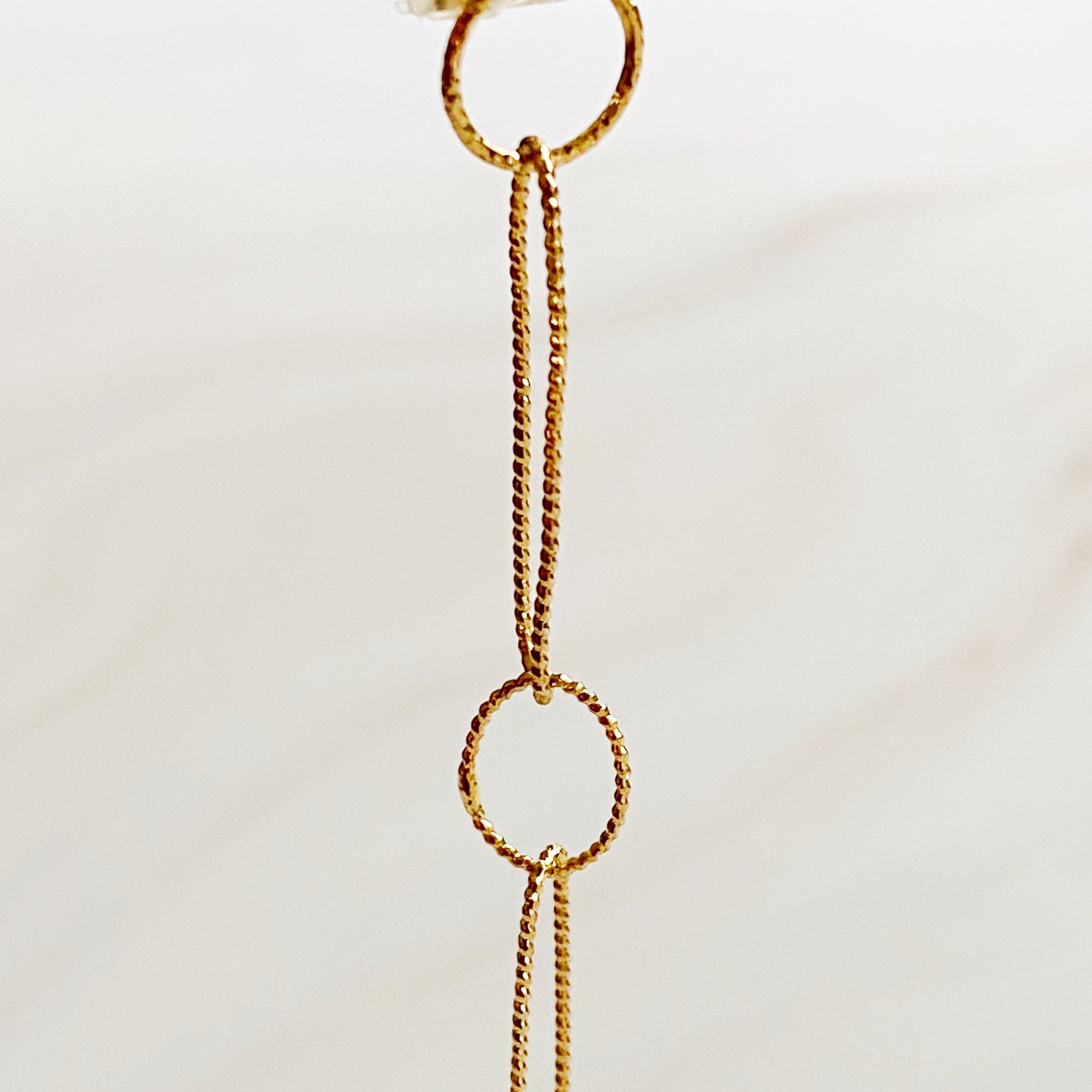 Gold-plated Dangle Dainty Chain Earrings with textured links, showcasing a stylish drop design.