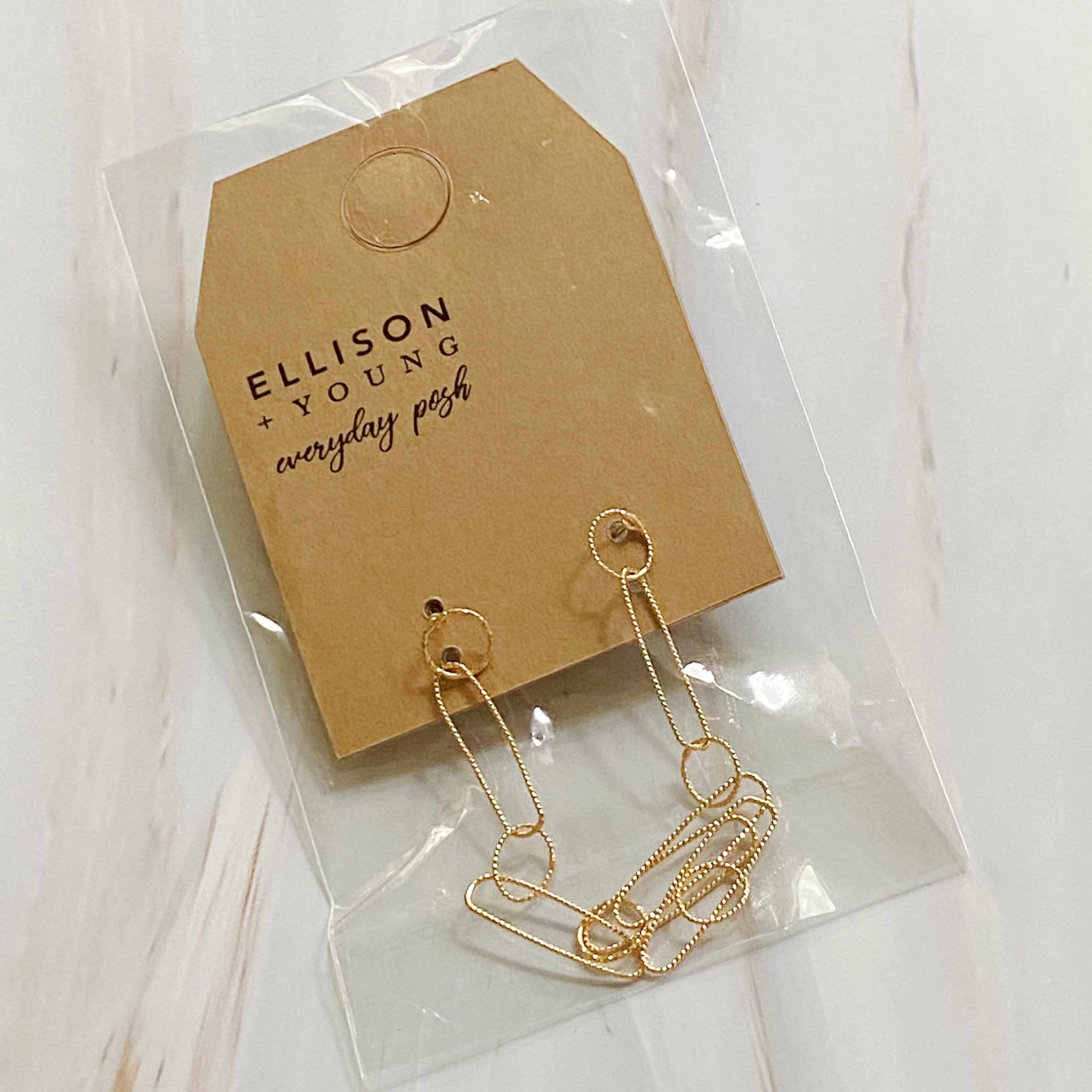 Gold-plated Dangle Dainty Chain Earrings with textured links, showcasing a stylish drop design.