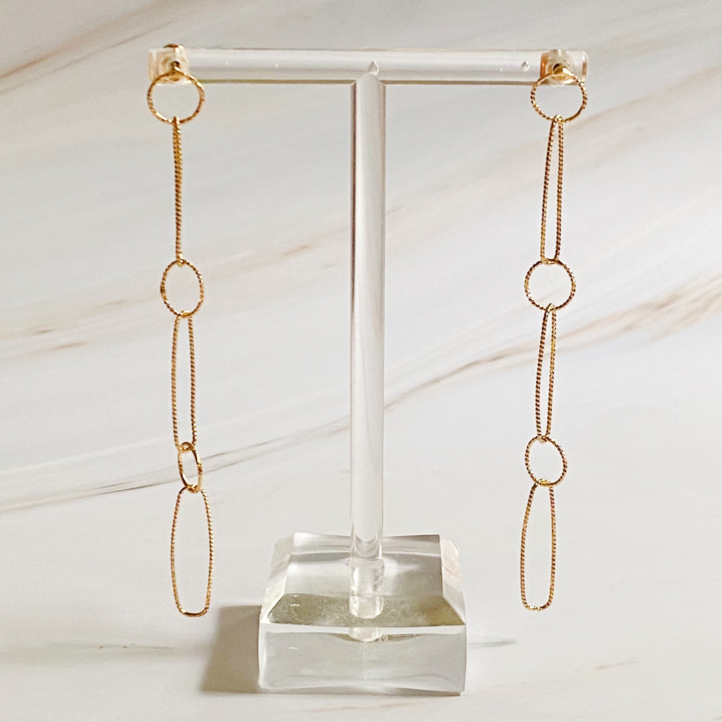 Gold-plated Dangle Dainty Chain Earrings with textured links, showcasing a stylish drop design.