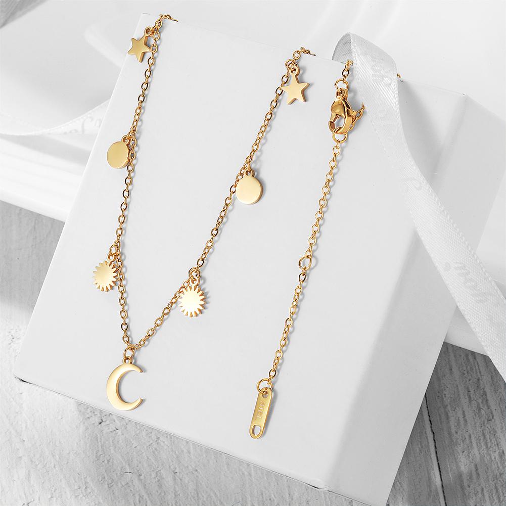 Dangling Celestial Necklace made of 316L surgical stainless steel with 14K gold PVD plating, showcasing celestial-themed design.