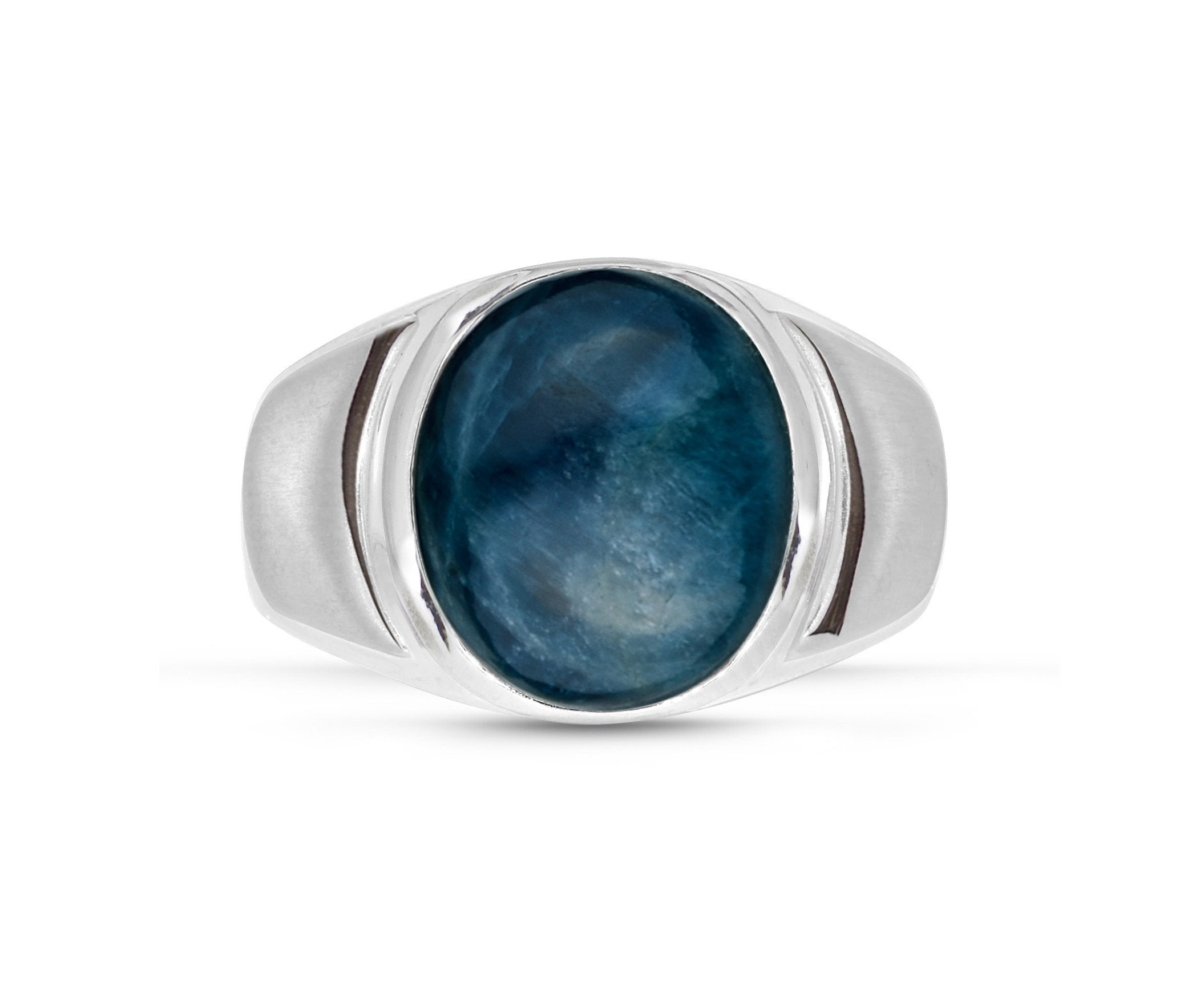 A stunning Dark Blue Apatite stone set in a handcrafted sterling silver signet ring, showcasing its vibrant color and elegant design.