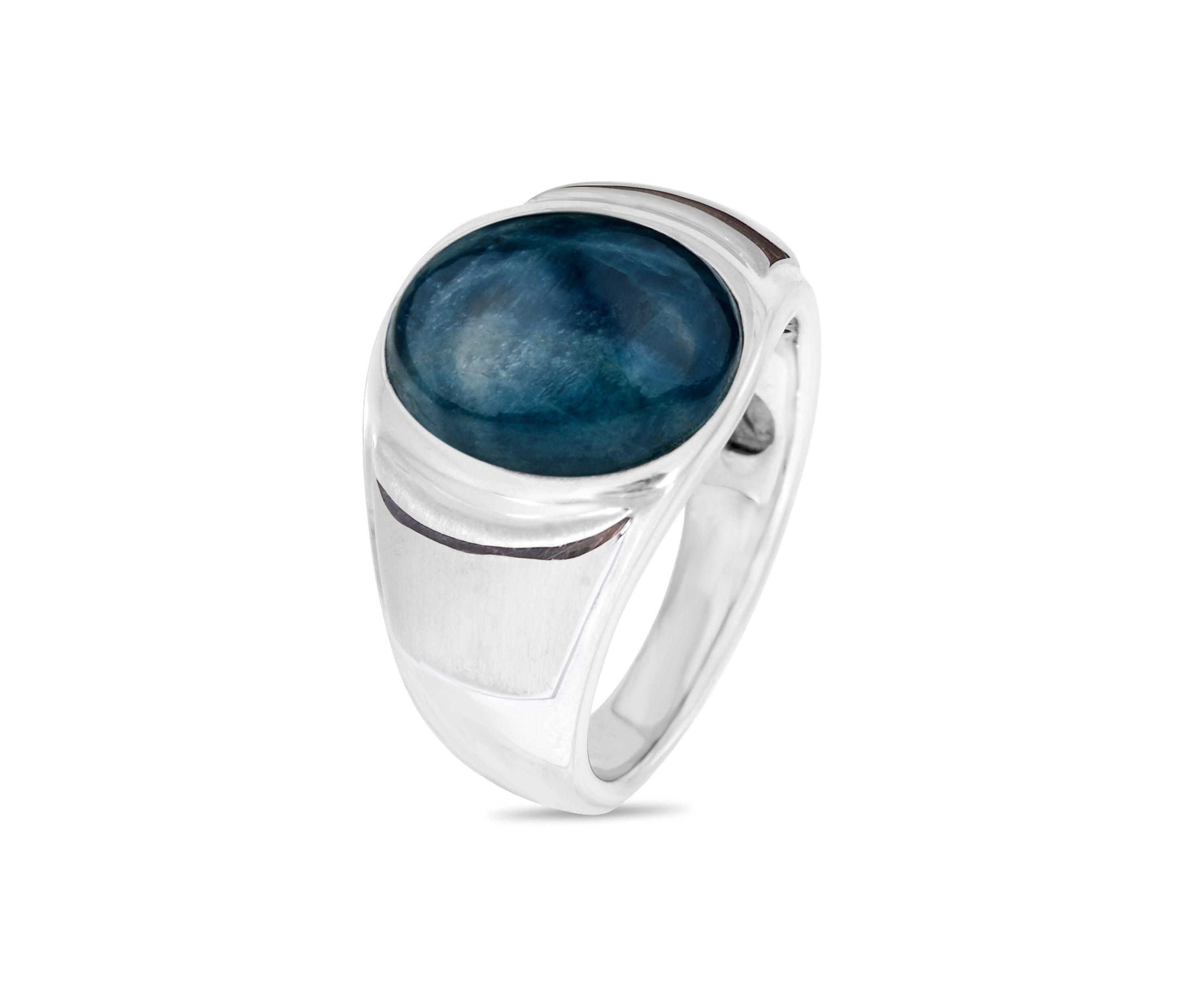 A stunning Dark Blue Apatite stone set in a handcrafted sterling silver signet ring, showcasing its vibrant color and elegant design.