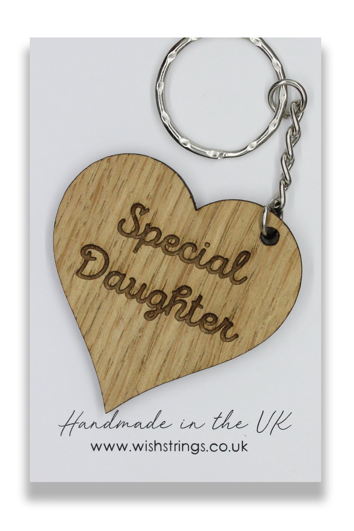 Handmade DAUGHTER Wooden Keyring crafted from oak veneer, featuring a silky smooth finish and presented on a decorative card.