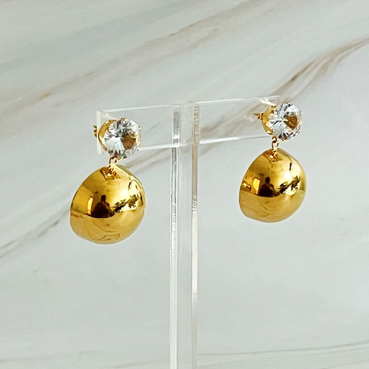 Elegant Day And Night Dangle Earrings in 18k gold plated stainless steel, showcasing their versatile design.