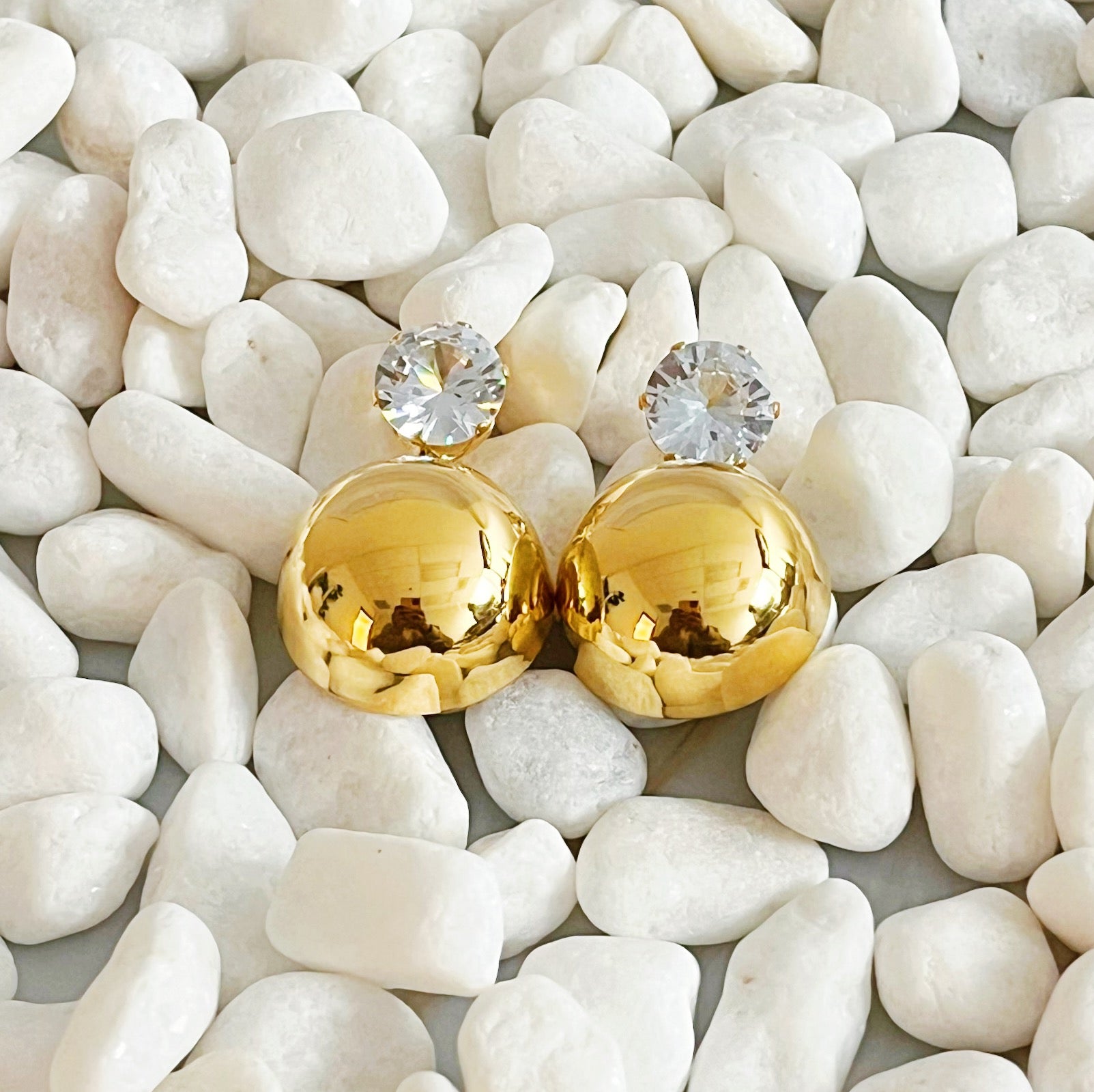 Elegant Day And Night Dangle Earrings in 18k gold plated stainless steel, showcasing their versatile design.