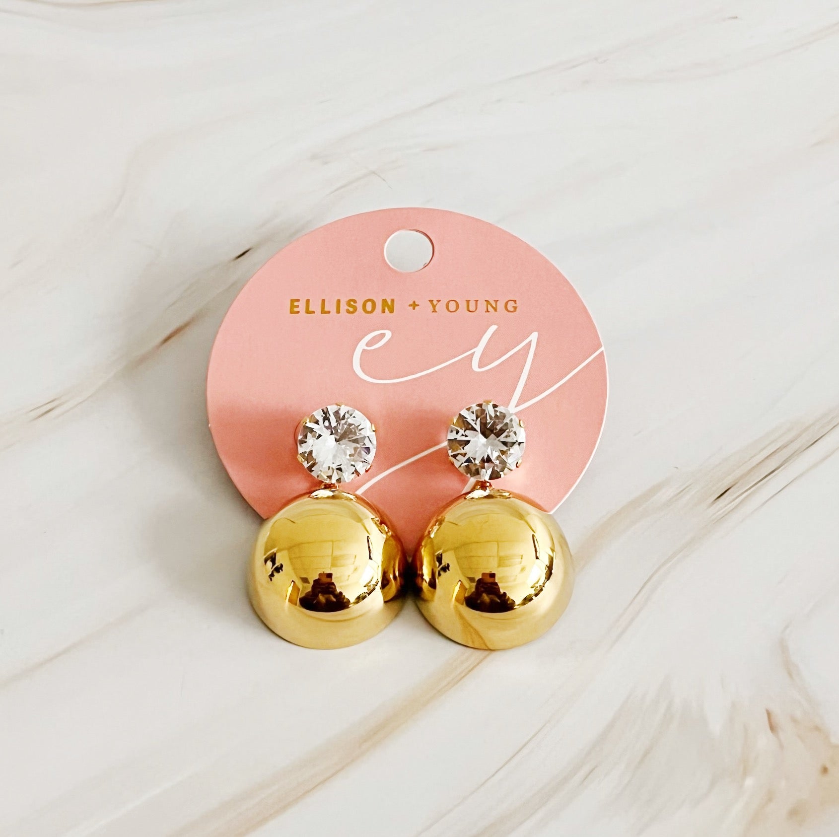 Elegant Day And Night Dangle Earrings in 18k gold plated stainless steel, showcasing their versatile design.