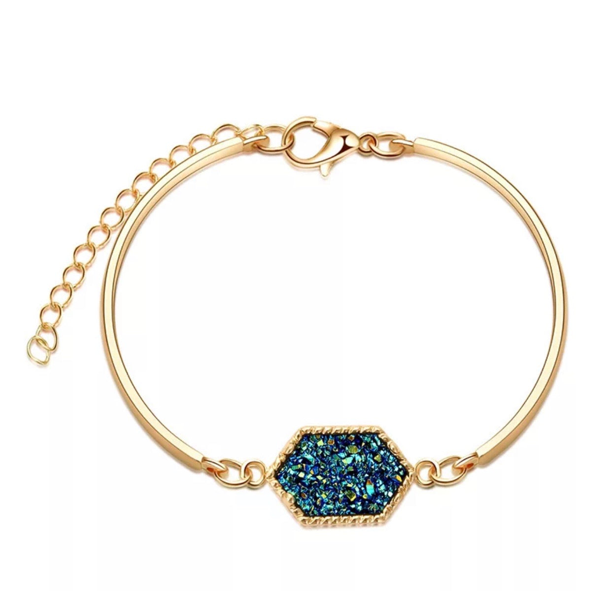 A sparkling Dazzling Dainty Druzy Bracelet featuring 24K gold plating and colorful druzy stones, elegantly displayed on a soft surface.