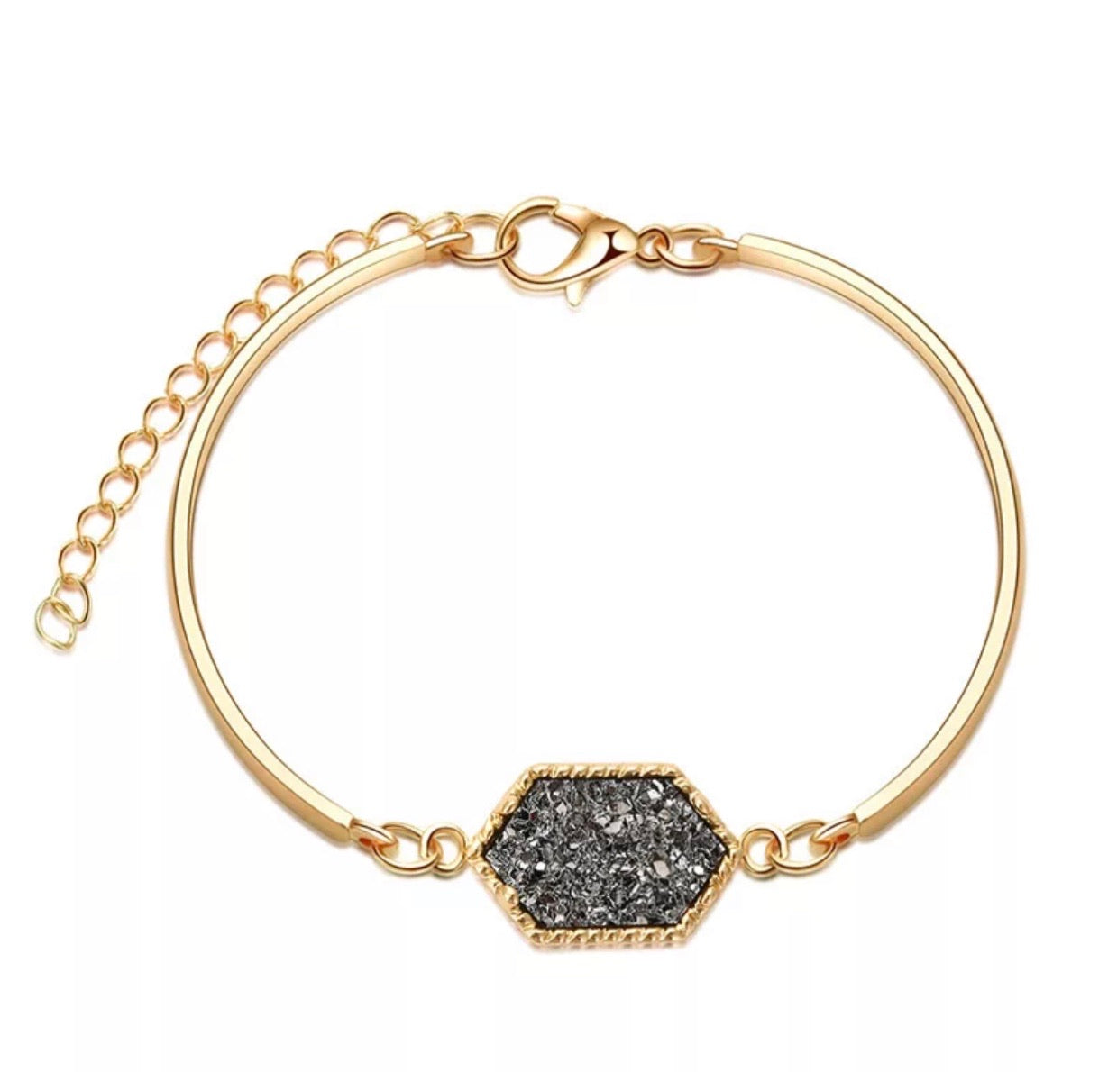 A sparkling Dazzling Dainty Druzy Bracelet featuring 24K gold plating and colorful druzy stones, elegantly displayed on a soft surface.