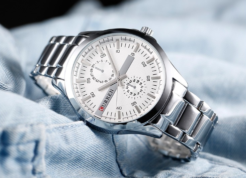 DEBONAIR CLASSIC METAL I 551061 watch with multifunctional features, compass, and calendar, showcasing its elegant design and durable construction.