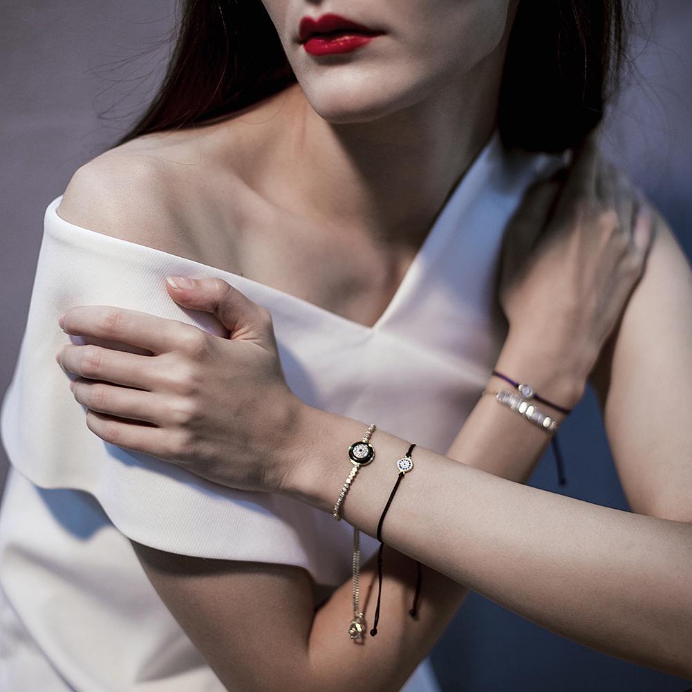 Deflective Energy Bracelet made of surgical stainless steel with 14K gold PVD plating, showcasing its elegant design.