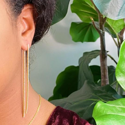 Delicate Shine Back Drop Earrings featuring two shiny strands, gold plated brass, and AAA grade cubic zirconia, perfect for any occasion.