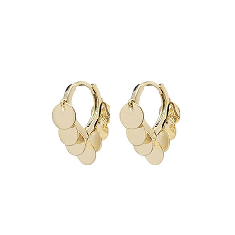 Delicate small hoop earrings featuring round tassels, crafted from lightweight alloy, perfect for stylish everyday wear.